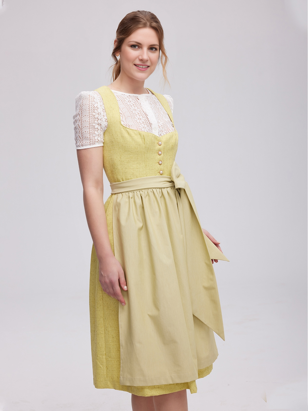 Elegantes gelbes Dirndl